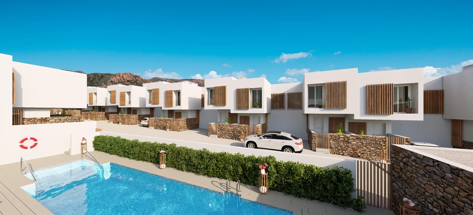 Fachada viviendas y piscina